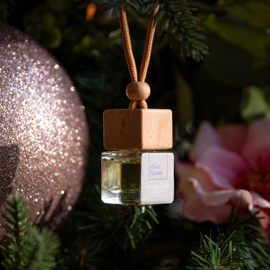Mini Aromatherapy Daily Rituals diffuser hanging from a tree. By Elsie and Tom
